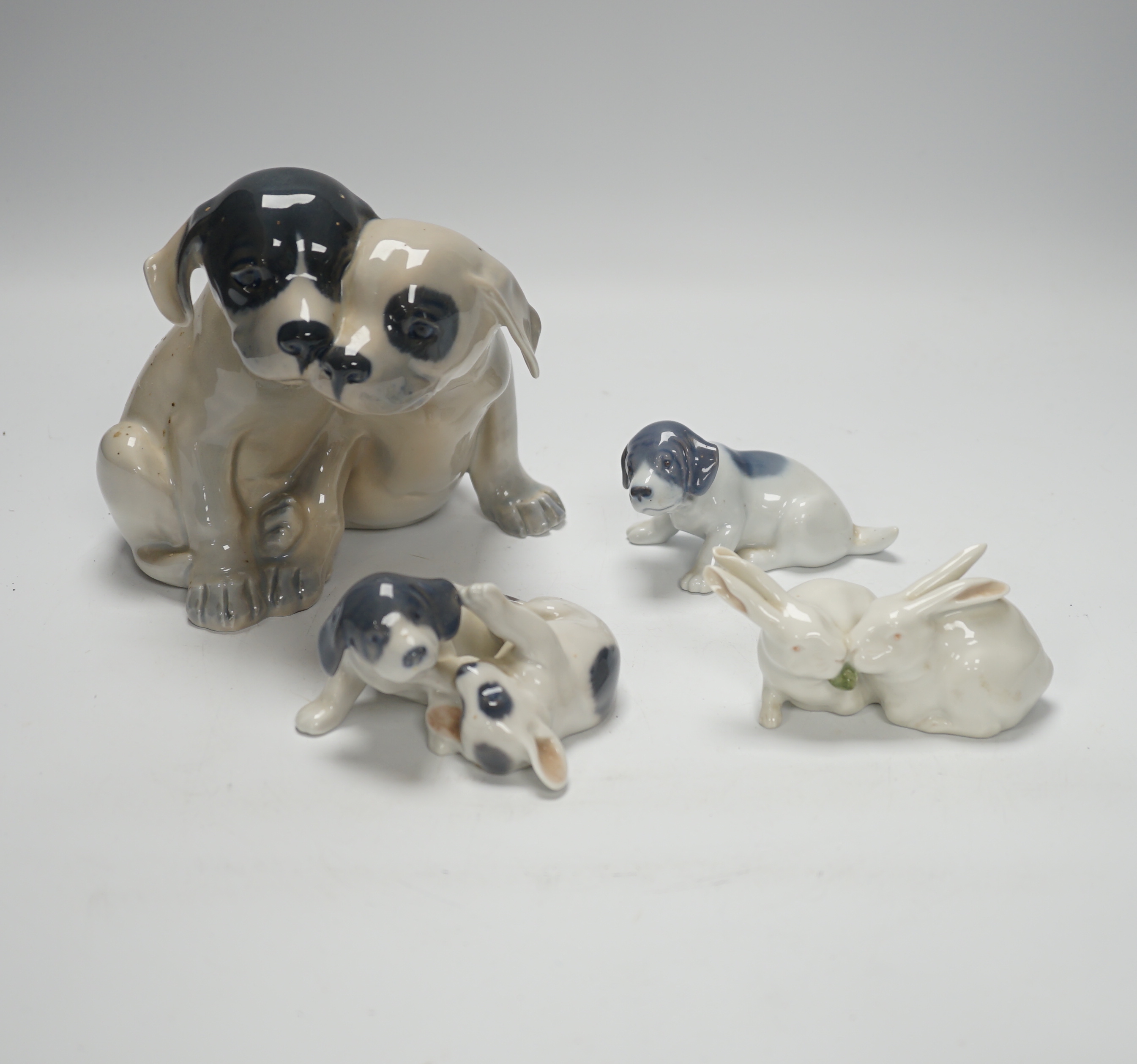 Four Royal Copenhagen animals, dogs and rabbits, tallest 15cm